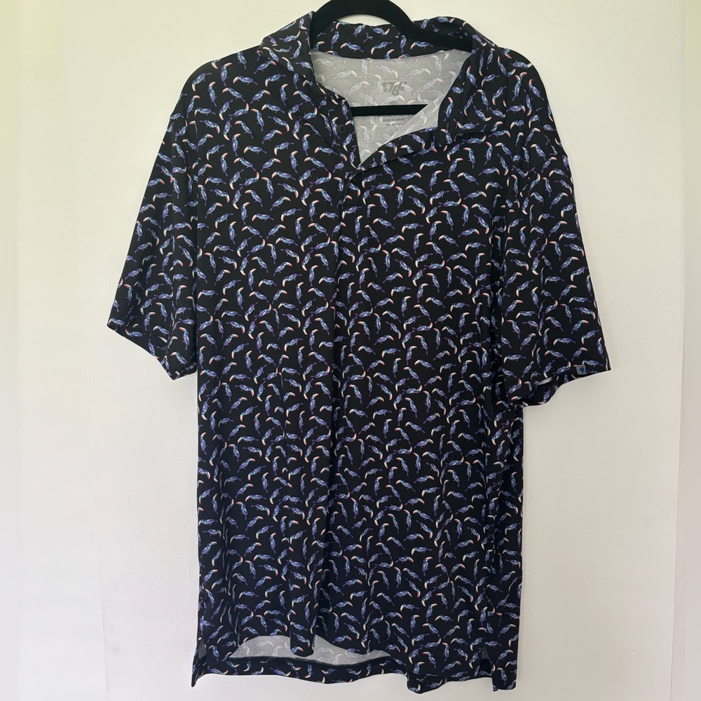 1764 Men’s golf polo. Black with purple parrot pattern. Size L.